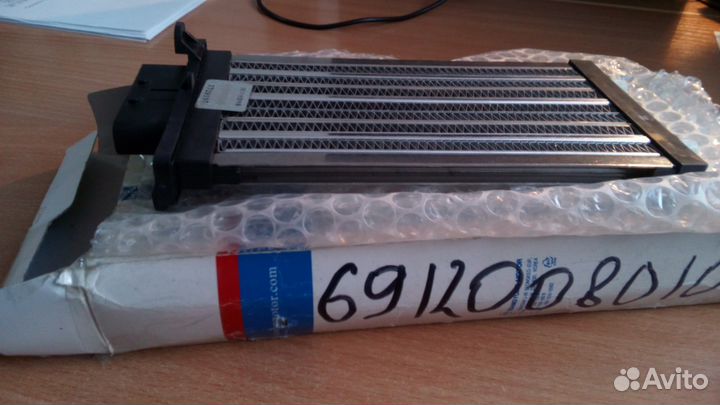 Ssangyong 6912008010 - Радиатор отопителя