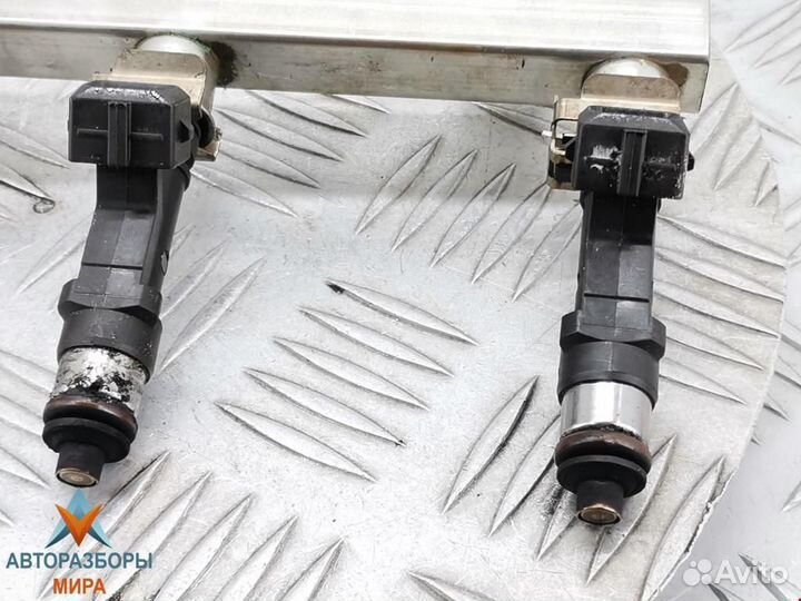 Форсунка Opel Corsa D рест. 2011 24420543