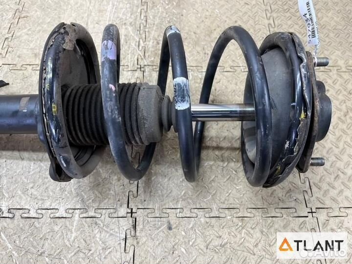 Стойка передняя левая nissan liberty