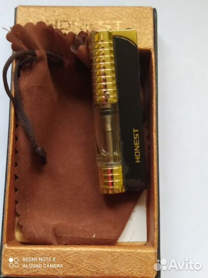 Зажигалка с окном уровня газа