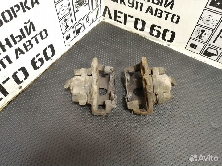 Суппорт тормозной передний Renault Logan II