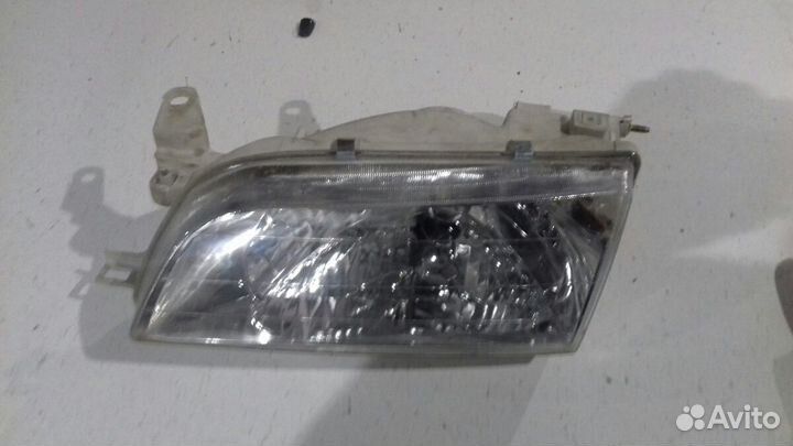 Фара передняя левая тойота ае 100