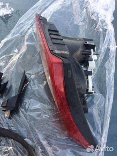 Фонарь левый крышки багажника Volkswagen Passat CC