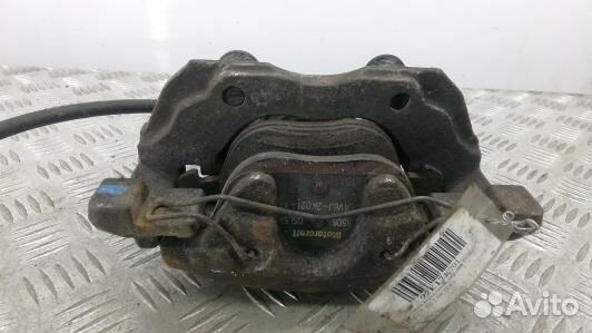 Суппорт тормозной передний левый ford focus 3 (92E