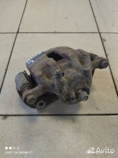 Суппорт тормозной передний левый Kia Rio 4