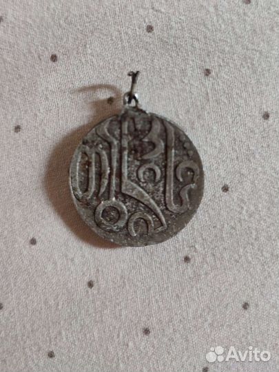 Какой-то Значок