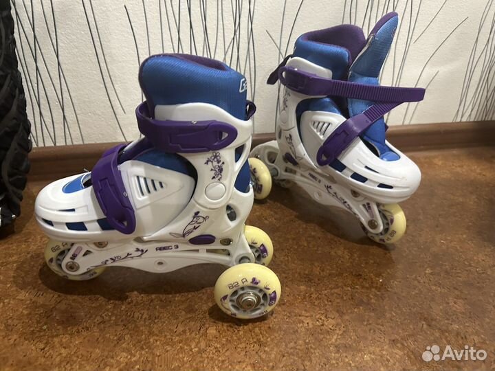 Роликовые коньки