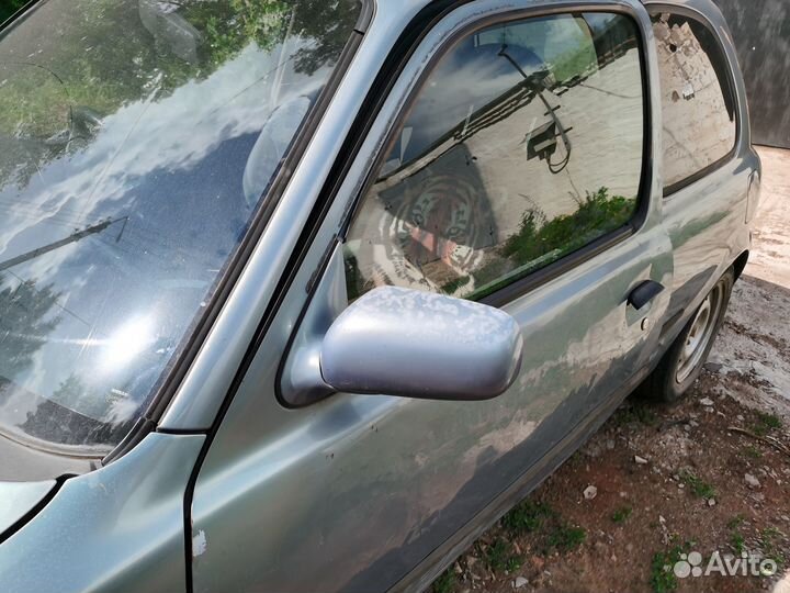 На nissan march k11