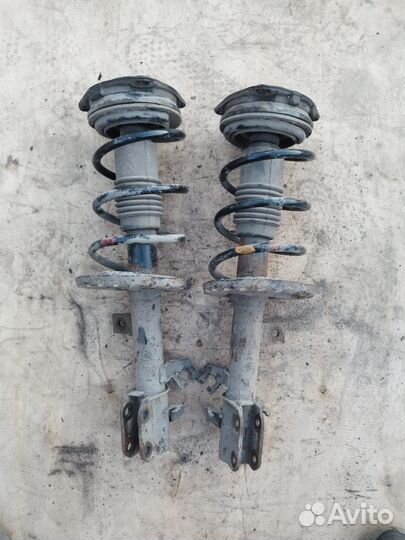 Передние стойки Nissan Note