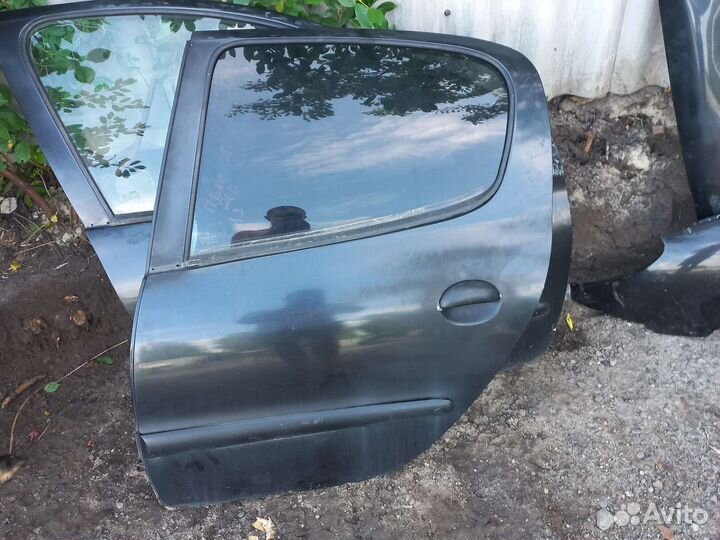 Дверь задняя левая peugeot 206
