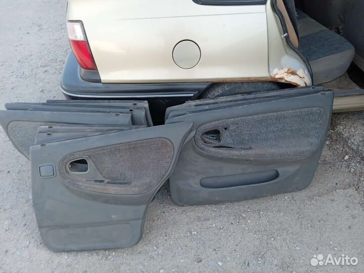 Обшивка двери Дэу Нексия