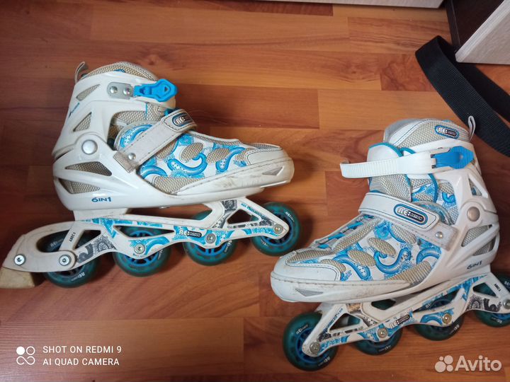 Роликовые коньки