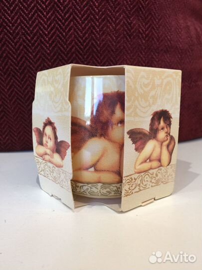 Свеча в стеклянном подсвечнике