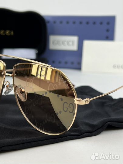 Солнцезащитные очки Gucci