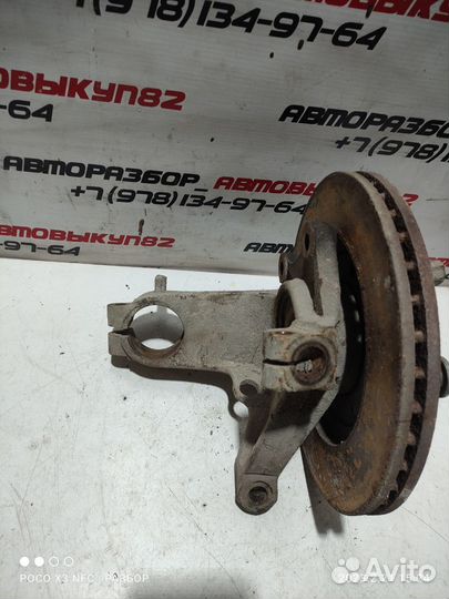 Кулак поворотный левый Пежо 206