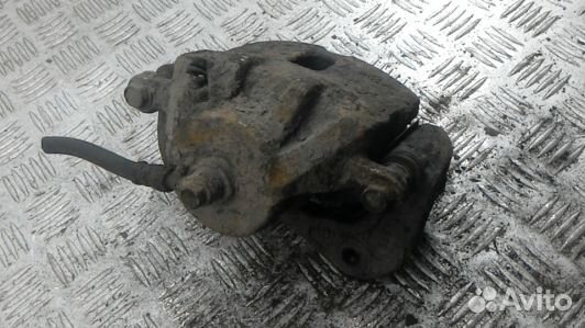 Суппорт тормозной передний левый hyundai tucson JM