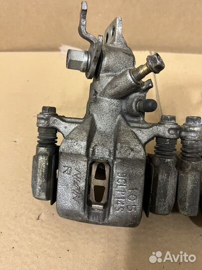 Суппорт тормозной задний Honda Accord 6 CF