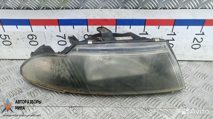 Фара правая Mitsubishi Carisma рест. 2002