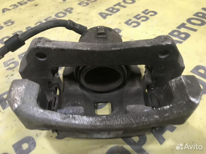 Суппорт тормозной передний левый Ford Fiesta