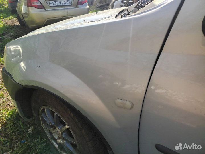 Крыло переднее правое Renault Logan 1.6 K7M 710