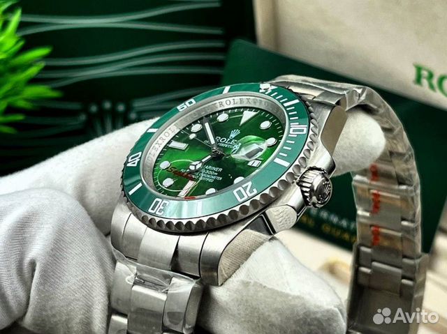 Очень красивые мужские наручные часы Rolex изумруд