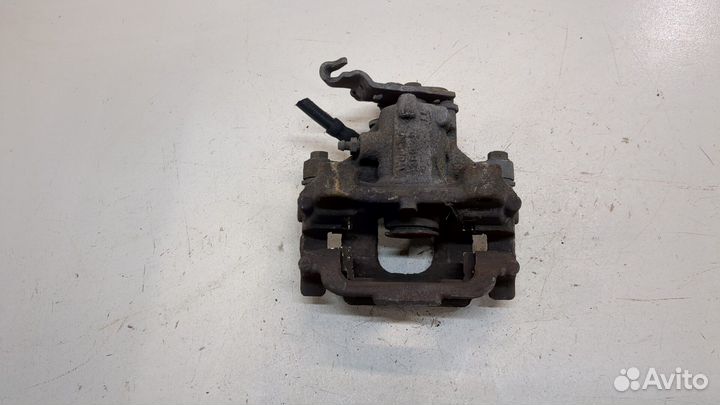 Суппорт левый задний Volkswagen Touran