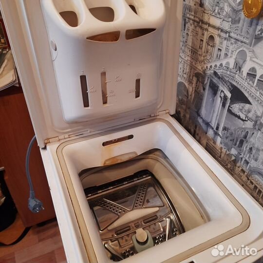 Стиральная машина с вертикальной загрузкой