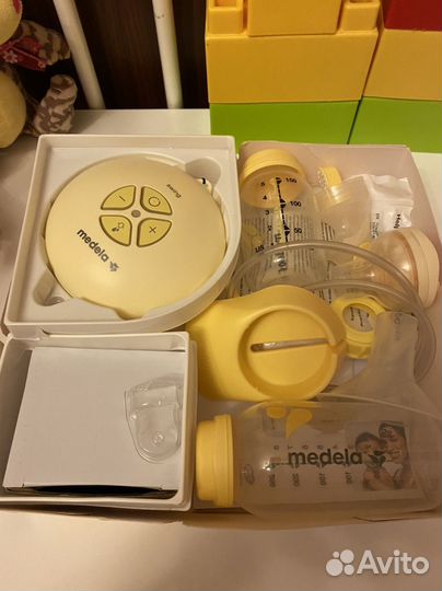 Электрический молокоотсос medela swing