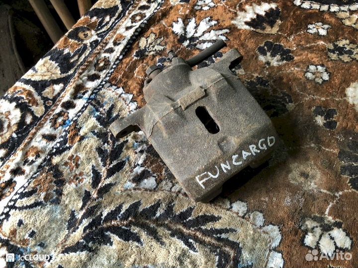 Суппорт на toyota funcargo NCP20