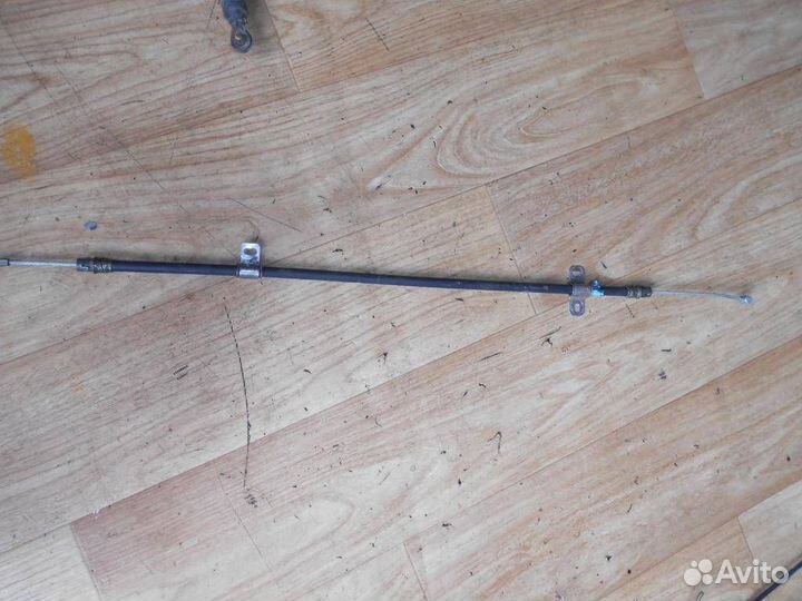 Трос стояночного тормоза центральный Jeep Grand C