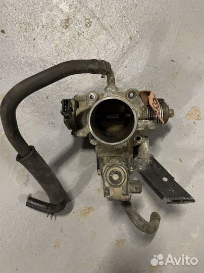 Заслонка дроссельная механика Kia Spectra