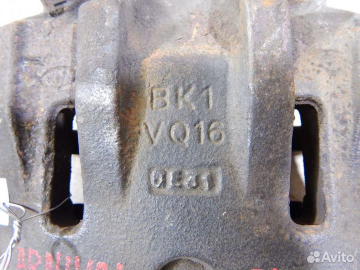 Суппорт тормозной передний левый Kia Carnival VQ