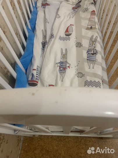 Детская кроватка с поперечным маятником