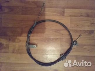 Тросик ручника левый задний Toyota corolla Axio