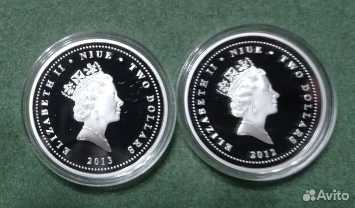 Монеты Ниуэ Фэн-шуй Журавли Рыбы Серебро