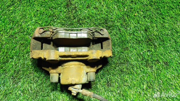 Суппорт передний левый Volkswagen Polo