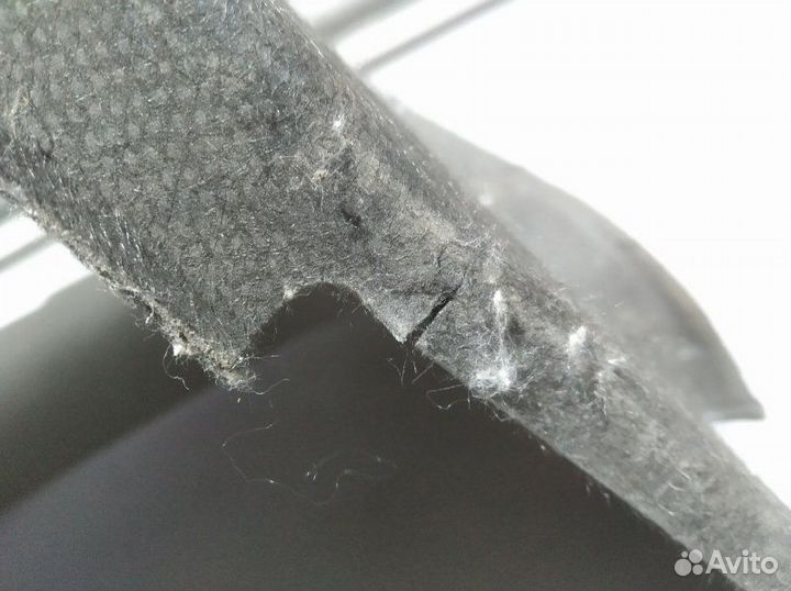 Обшивка багажника задняя левая Toyota Corolla 120