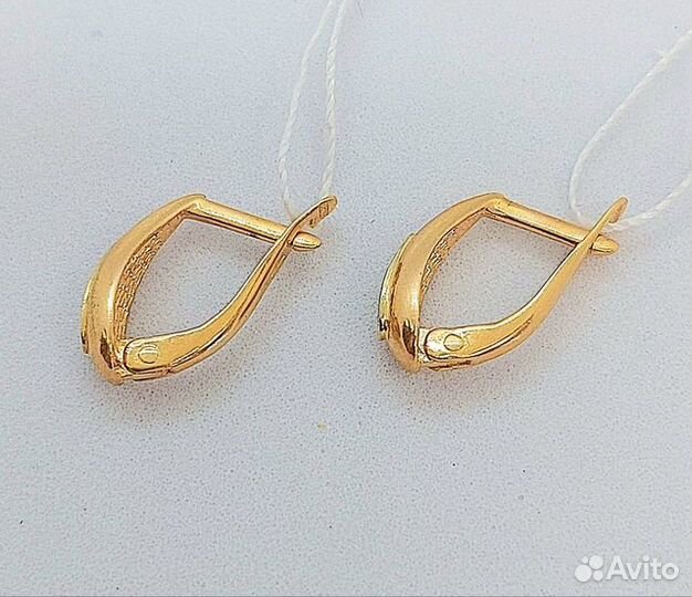 Золотые серьги с камнем