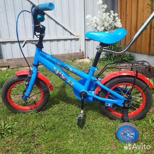 Детский четырёх колёсный велосипед