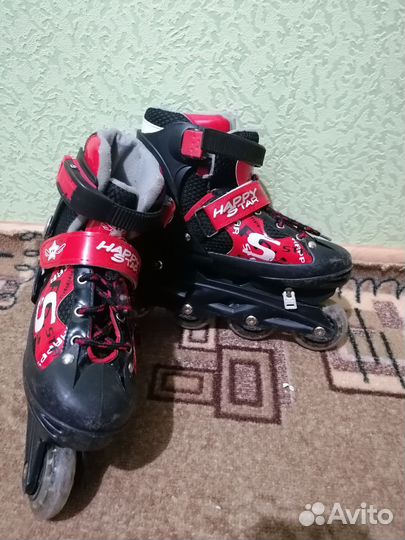 Роликовые коньки