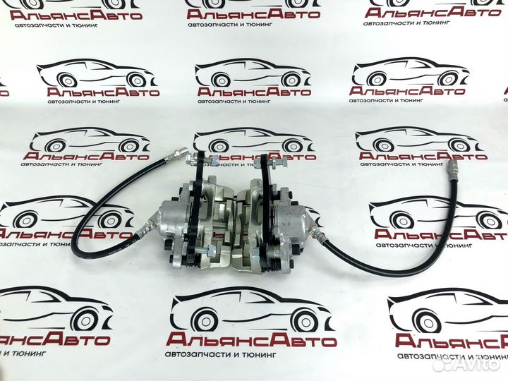 Суппорта ваз на ниву комплект - в сборе