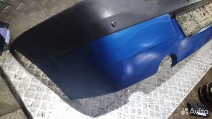 Бампер Logan (04-10) зад под парктроник Б\У