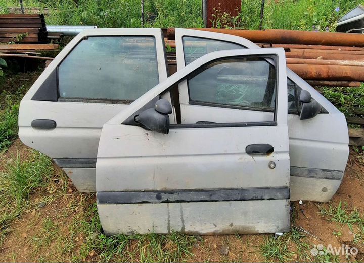 Двери Ford Escort