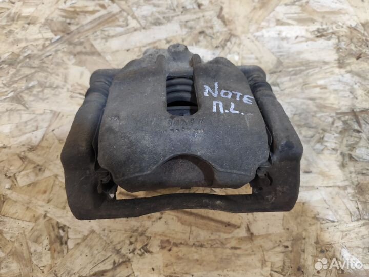 Суппорт передний левый Nissan Note