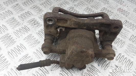 Суппорт тормозной задний левый opel antara (YNI16M