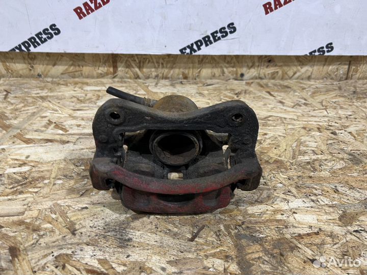 Суппорт тормозной перед левый Hyundai Elantra XD