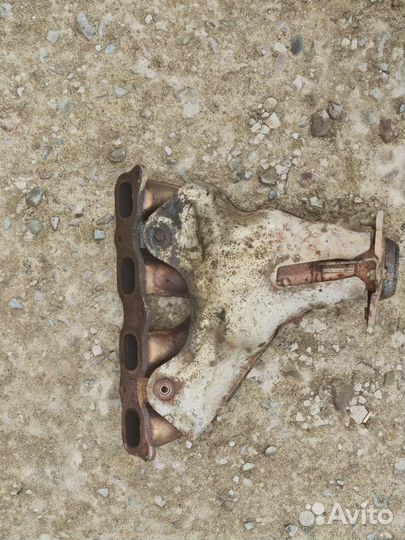 Впускной выпускной коллектор Mitsubishi Lancer X