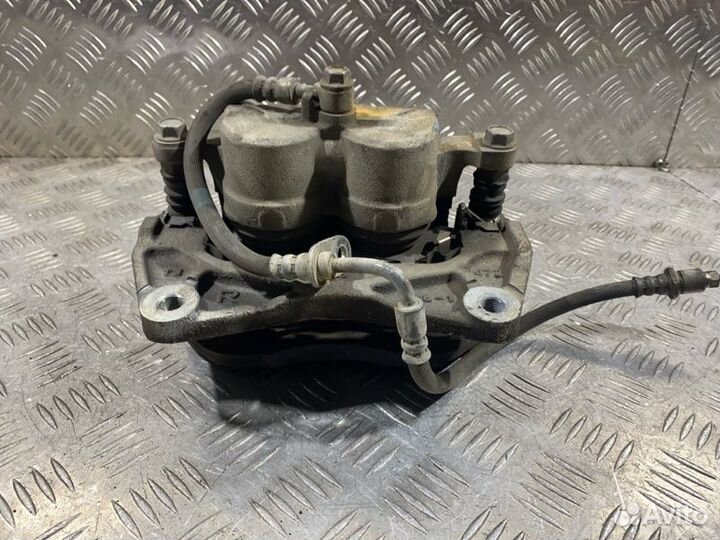 Суппорт передний правый Subaru Outback BS