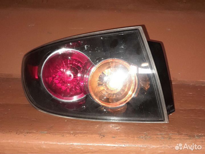 Фара задняя в левое крыло mazda 3 вк седан