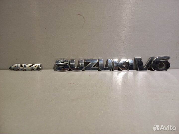 Эмблема Suzuki Grand Vitara Xl7 H27A 2001
